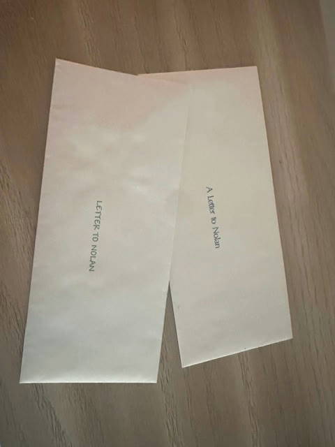 Two sealed envelopes labeled A Letter to Nolan